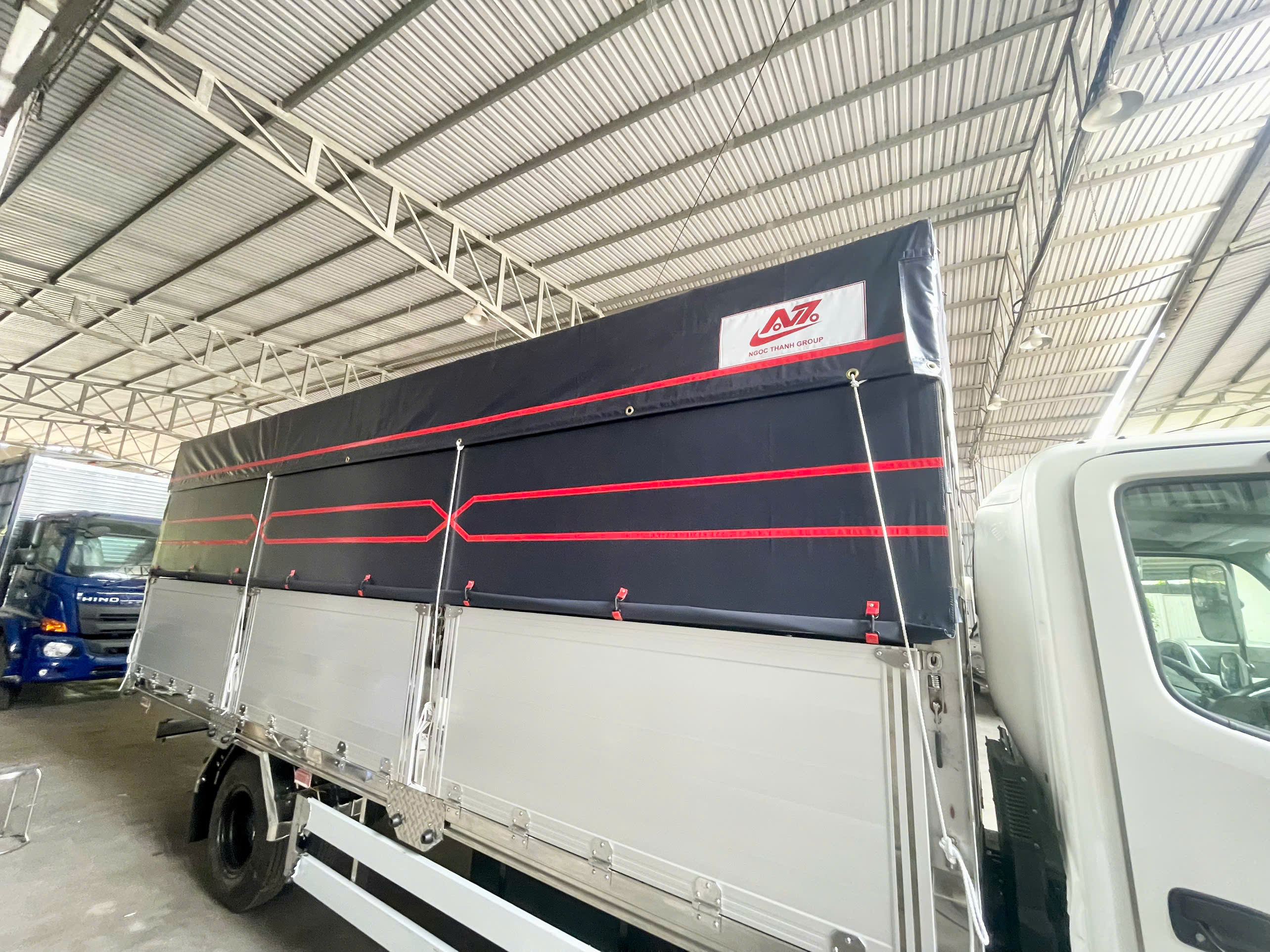 Tiêu chuẩn độ dày bạt xe tải: Chọn bao nhiêu mm là hợp lý nhất?